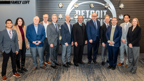 A large group of attendees gathered to celebrate our new department chairs